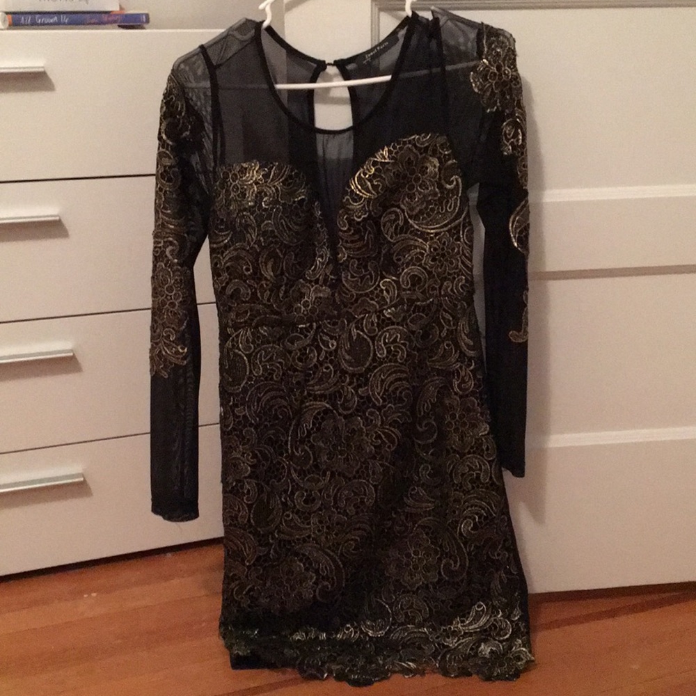 Black mesh and gold dress